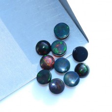 Black opal 7mm round cabochon